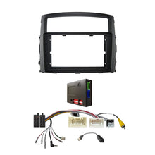 Load image into Gallery viewer, CAC F9MT22K7 9 Inch Fascia Kit Compatible with Mitsubishi Pajero 2012-2019 Dash 4 Rockford Fosgate